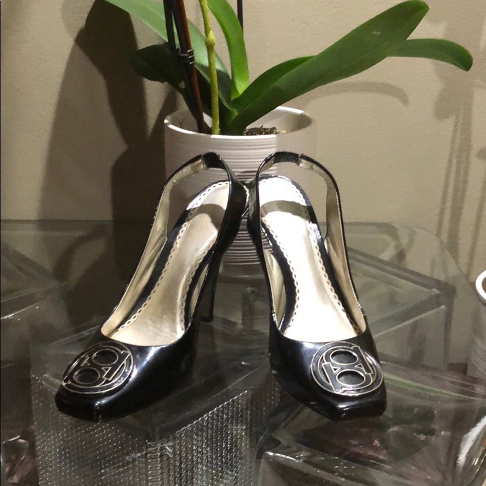 Bebe Leather with logo.Black high heels 5”  Size 8